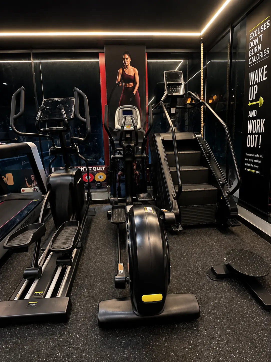 Cardio zone with elliptical trainers and stair climber