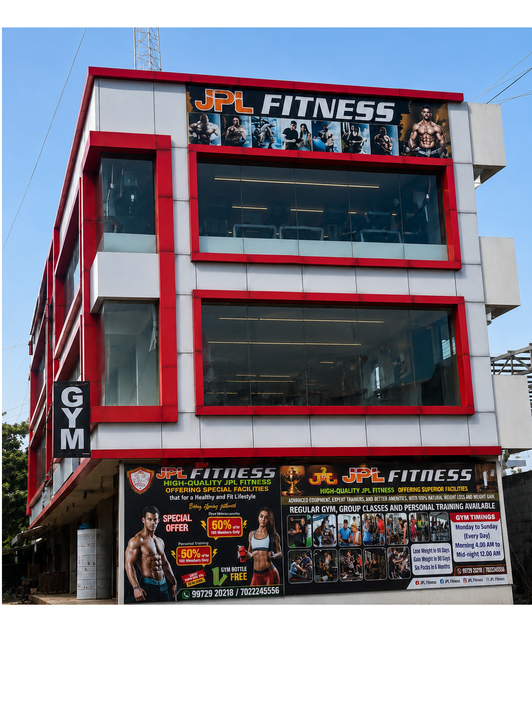 JPL Fitness three-storey gym building with GYM signage and facilities banner